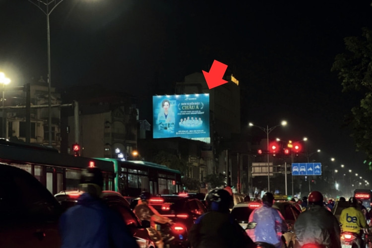 Night view- Horizontal Wallscape Billboard at Giai Phong & Truong Dinh T-Junction, Dinh Cong Ward, Ha Noi City